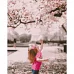 Картина за номерами ПРЕМІУМ Дівчинка у квітах сакури розміром 40х50 см Strateg (GS229)
